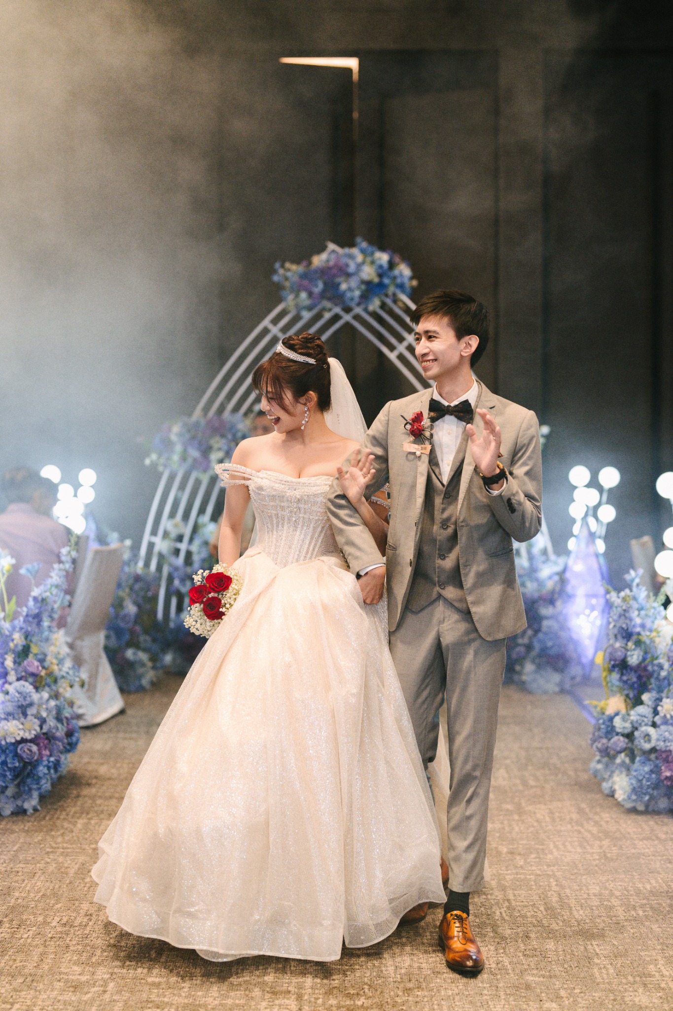 Newlyweds walking down the wedding aisle